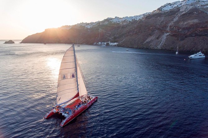 Sailing Catamaran Cruise in Santorini with BBQ, Drinks and Transfer - What the boat feels like with up to 55 people