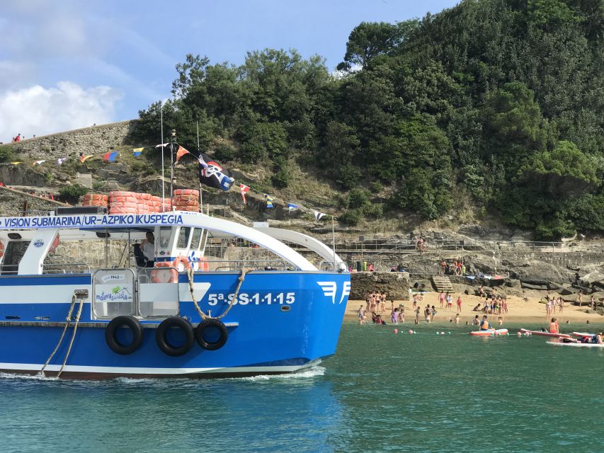San Sebastian: Boat Tour with Stop at Santa Clara - Audio guide: useful, but not fully guided
