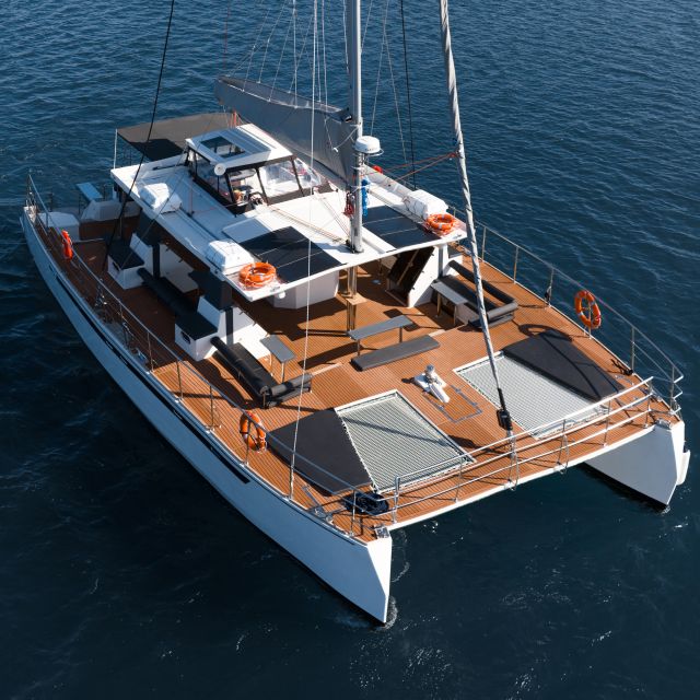 Santorini: Catamaran Caldera Cruise with Meal and Drinks - Aspronisi, Indian Rock, and the Venetian Lighthouse