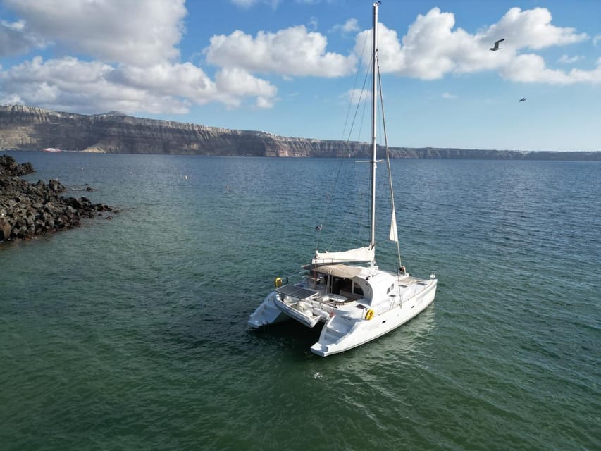 Santorini: Catamaran Cruise with Greek BBQ and Drinks - Setting out from Vlychada Marina