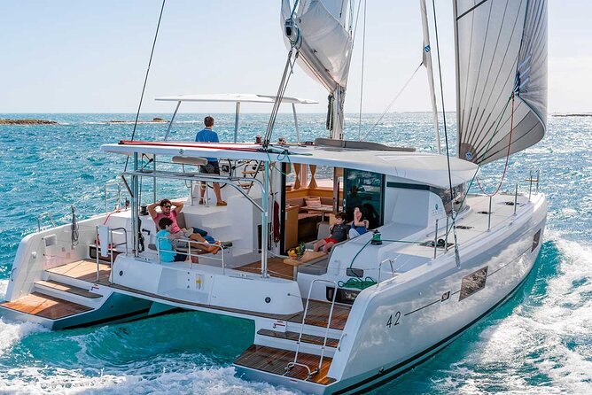 Santorini Catamaran Cruise with Greek Meal, Open-Bar and Sunset - Pickup from your hotel and the ride to the marina