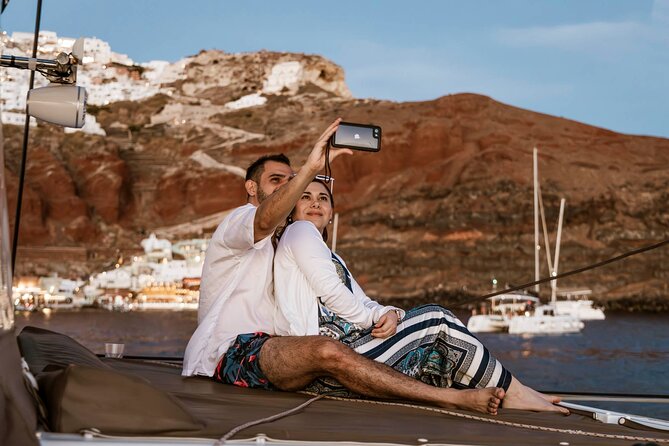 Santorini Catamaran Cruise with Greek Meal, Open-Bar and Sunset - Choosing between morning, classic, and luxury cruises
