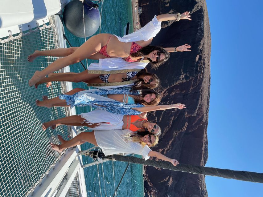Santorini: Catamaran Cruise with Meal & Open Bar - Black Beach and the Akrotiri lighthouse