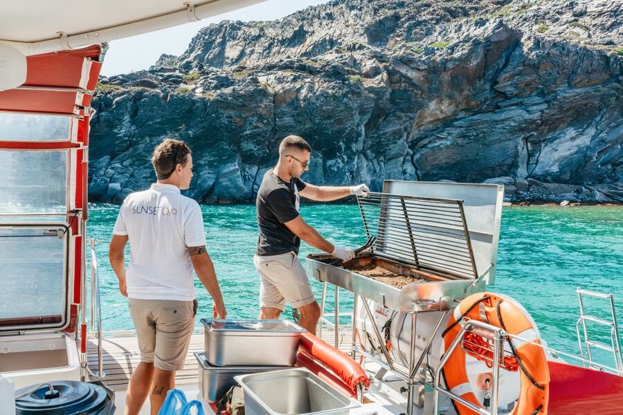 Santorini: Catamaran Tour with BBQ Dinner, Drinks, and Music - Music, dancing, and the mood onboard