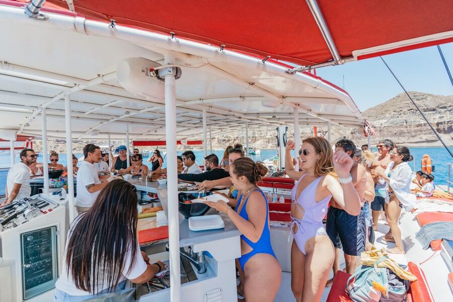 Santorini: Catamaran Tour with BBQ Dinner, Drinks, and Music - The crew and onboard comfort