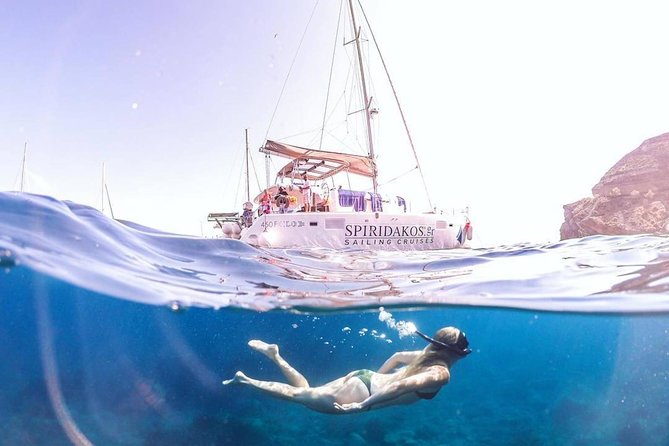 Santorini Classic Catamaran Cruise with BBQ, Drinks and Transfers - Daytime Sailing or Santorini Sunset