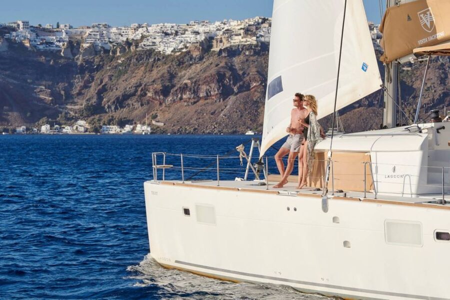 Santorini Gold Catamaran Cruise with Snorkel, BBQ & Open Bar - Leaving Vlychada Marina for the Caldera