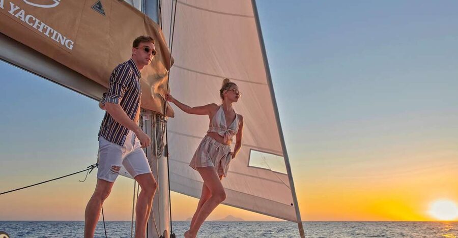 Santorini Gold Catamaran Cruise with Snorkel, BBQ & Open Bar - Red Beach and Santorini’s volcanic colors