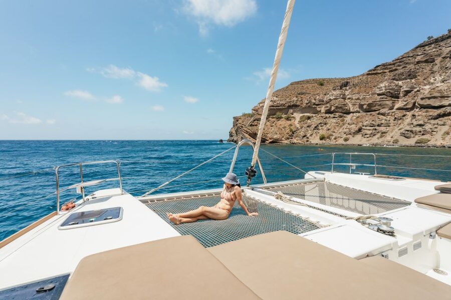 Santorini: Luxury Catamaran Day Trip with Meal and Open Bar - Hotel Pickup and the Trip to the Port