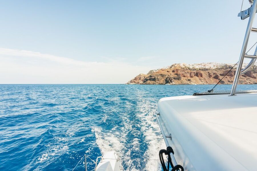 Santorini: Luxury Catamaran Day Trip with Meal and Open Bar - A Greek Meal Cooked on the Catamaran
