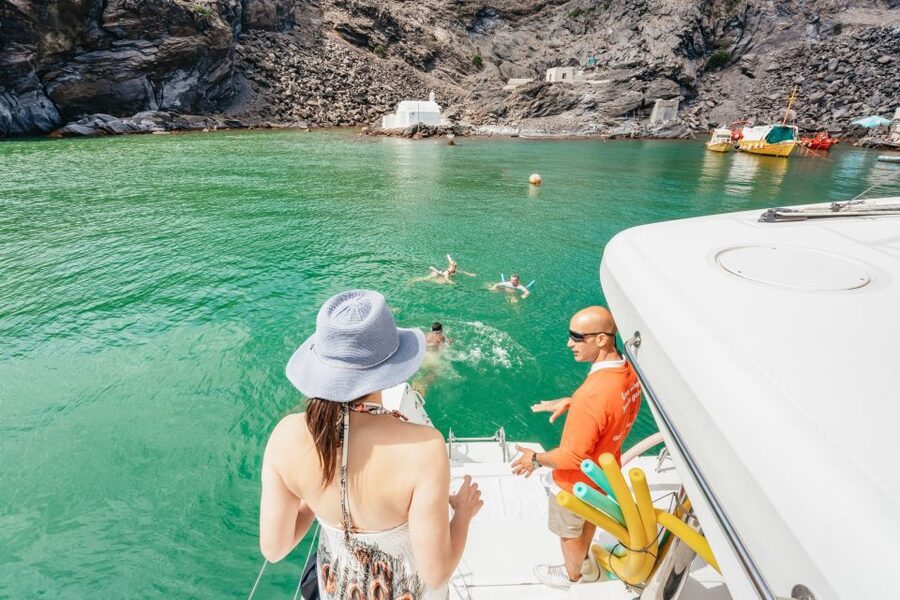 Santorini: Luxury Catamaran Day Trip with Meal and Open Bar - Sailing Past Santorini’s Best Coastal Views