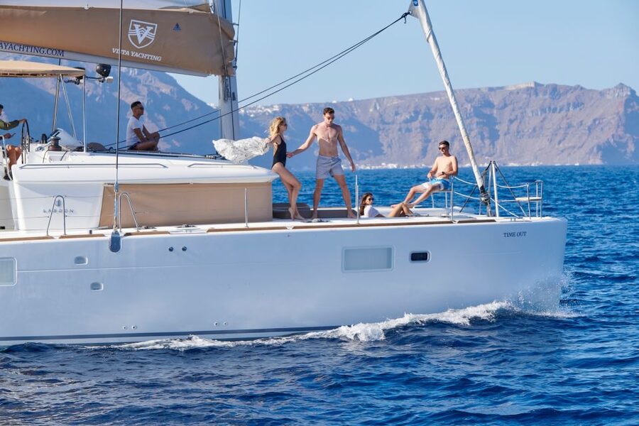 Santorini: Platinum Catamaran Cruise w/ BBQ Meal & Open Bar - Mesa Pigadia and the first real swim