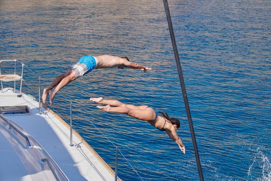 Santorini: Platinum Catamaran Cruise w/ BBQ Meal & Open Bar - The hot springs at Palea Kameni
