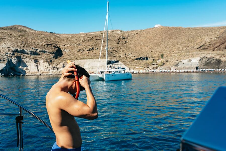 Santorini: Sailing Catamaran Cruise with BBQ and Drinks - The caldera, Indian Rocks, and the volcano