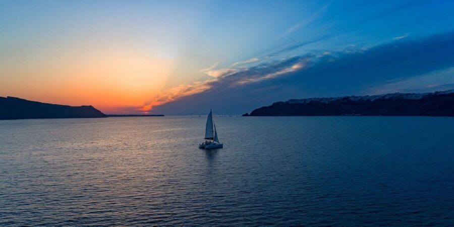 Santorini: Sunset Cruise with Swim Stops, Dinner, and Drinks - Five things to know before booking