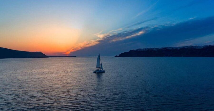 Santorini: Sunset Cruise with Swim Stops, Dinner, and Drinks - Starting at Vlychada Beach