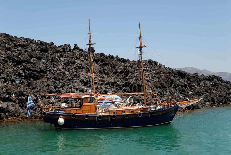 Santorini: Thirassia Islands and Volcano Guided Cruise - Palea Kameni and the short hot-spring swim