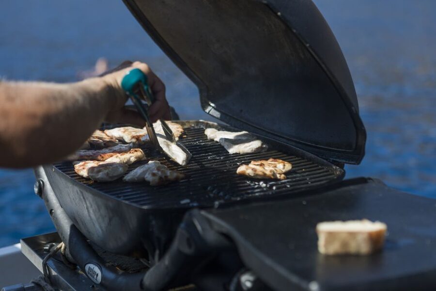 Santorini: Traditional Wooden Boat Tour with Meal and Wine - Key points to know before booking