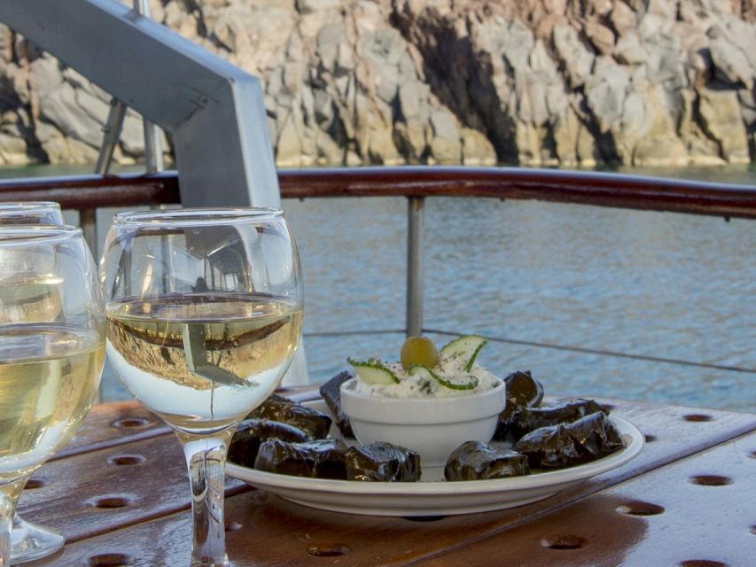Santorini: Traditional Wooden Boat Tour with Meal and Wine - Why this boat trip works so well