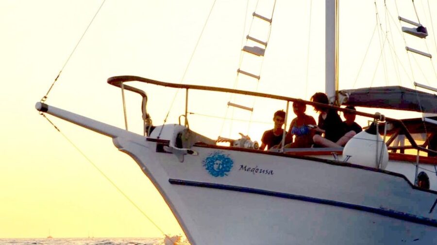 Santorini: Traditional Wooden Boat Tour with Meal and Wine - Red Beach, White Beach, and the Akrotiri coast