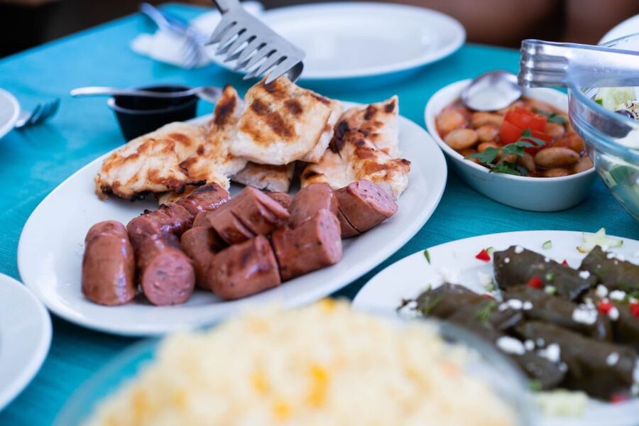 Santorini: Traditional Wooden Boat Tour with Meal and Wine - Entering the caldera and seeing the volcano