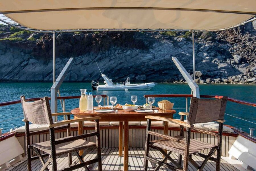 Santorini: Traditional Wooden Boat Tour with Meal and Wine - Ammoudi Bay and the sunset option