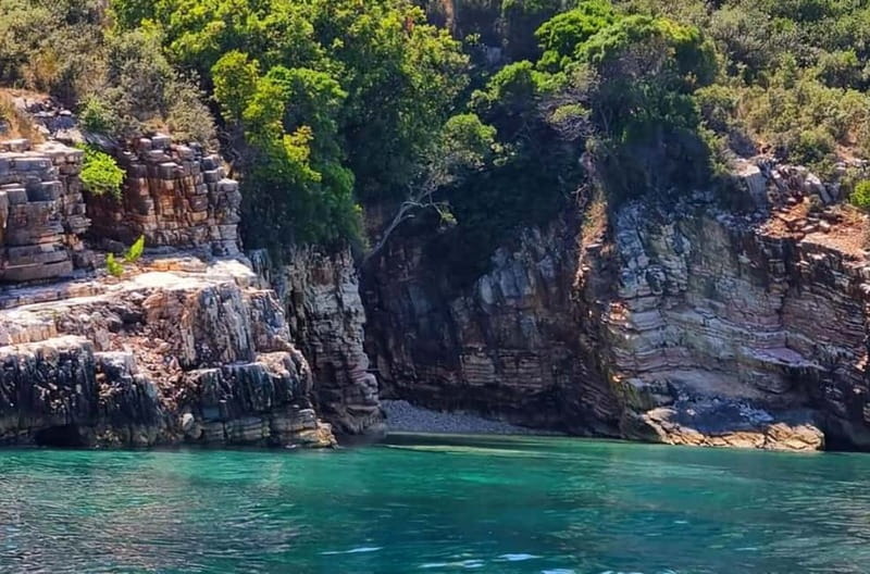 Sarandë: Boat Tour at Kroreza & Hidden Caves with Snorkeling - First sights: Milot Cave and the rocky coast