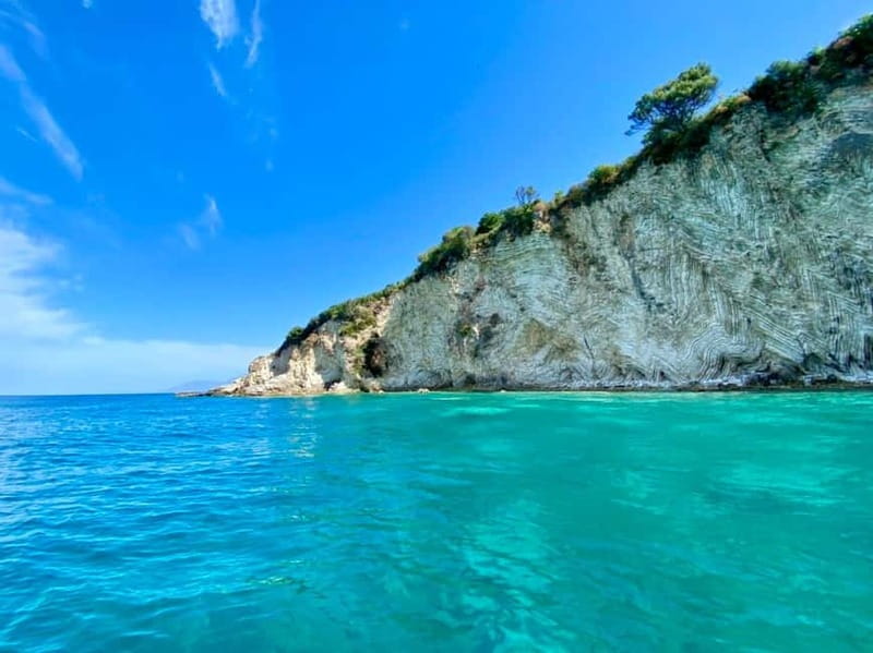 Sarandë: Ionian Coast Hidden Beaches and Caves Boat Tour - What the boat ride feels like in practice