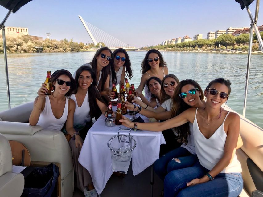 Seville: Exclusive River Boat Tour with Tapas - Sunset, weather, and comfort on board