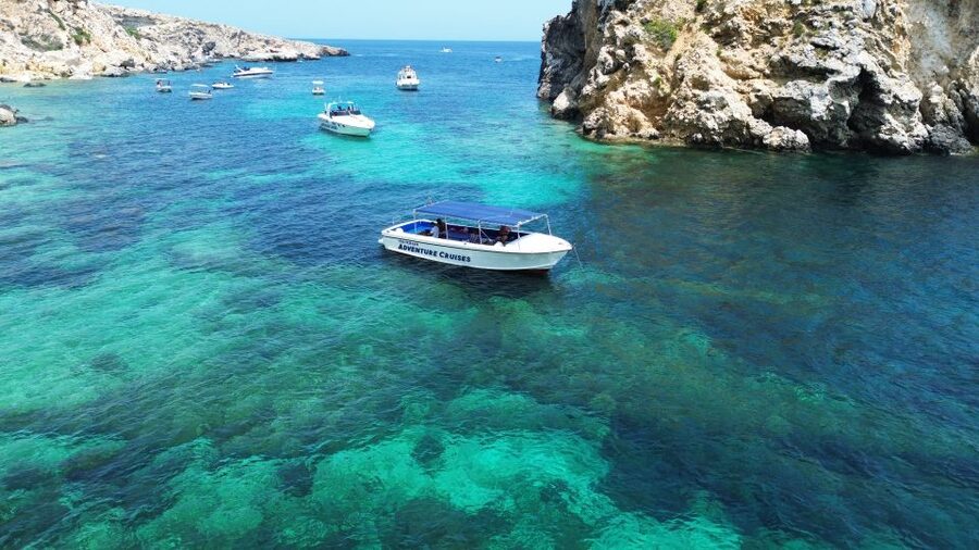 Sliema: Boat Trip to Comino Blue Lagoon, Gozo, and Caves - Walking Comino between swims