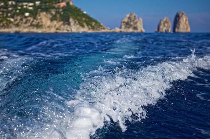 Small Group Capri Island Boat Ride with Swimming and Limoncello - Punta Carena and the return to Marina Grande