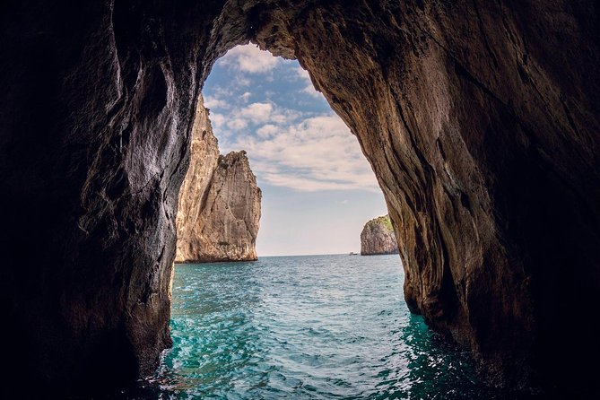 Small Group Capri Island Boat Ride with Swimming and Limoncello - White Grotto and the first coastal views