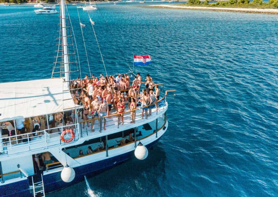 Split: Blue Lagoon Boat Party, Djs, Swim, Shots & AfterParty - Blue Lagoon swimming, jumps, and the boat slide