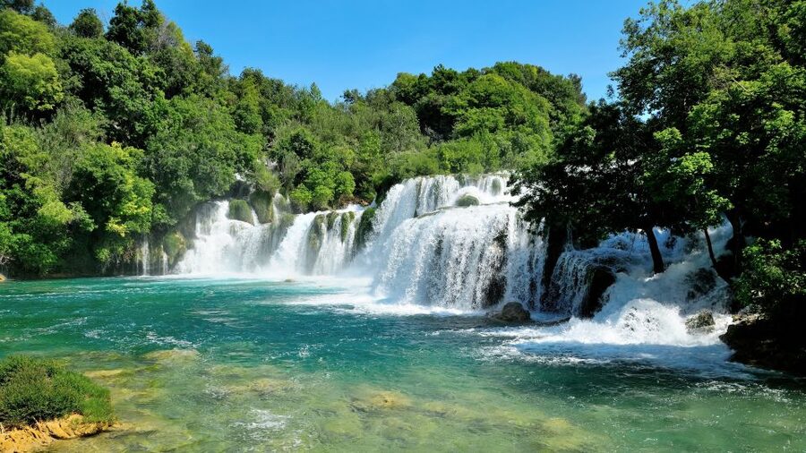 Split: Krka National Park Day Trip with Boat Ride & Swimming - One hour in Skradin: swim, stroll, or eat