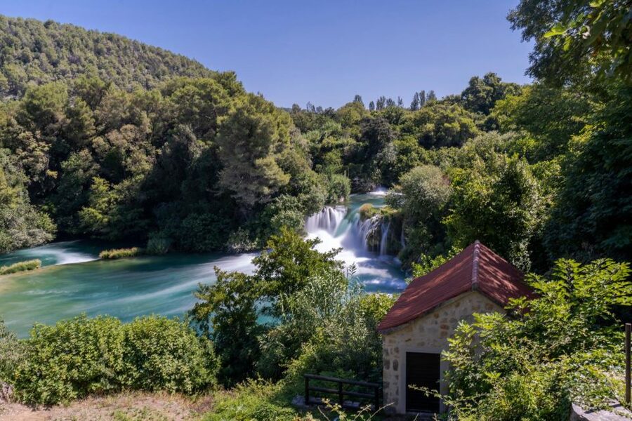 Split: Krka Waterfalls With Boat Cruise, Wine and Olive Oil - Walking around Skradinski buk