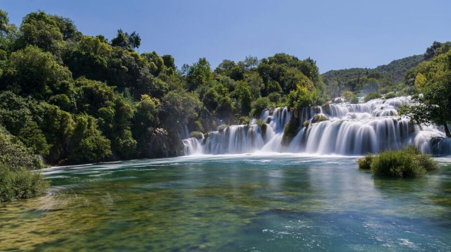 Split: Krka Waterfalls With Boat Cruise, Wine and Olive Oil - Old mills, stone houses, and early electricity