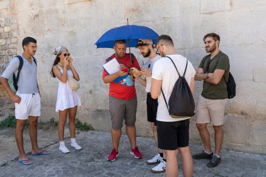 Split: Krka Waterfalls With Boat Cruise, Wine and Olive Oil - Skradin, beach time, and the swimming rule