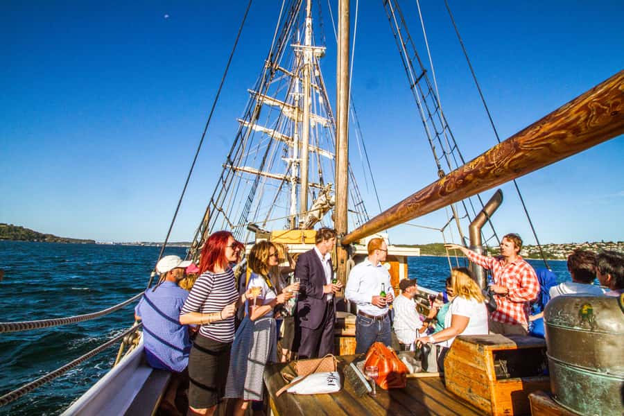 Sydney: Tall Ship Harbour Twilight Dinner Cruise - Helping with sails and trying the wheel