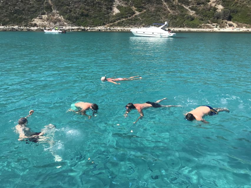 Tropea: Capo Vaticano Boat Trip with Snorkeling & Drink - Prosecco, Calabrian snacks, and a lively crew