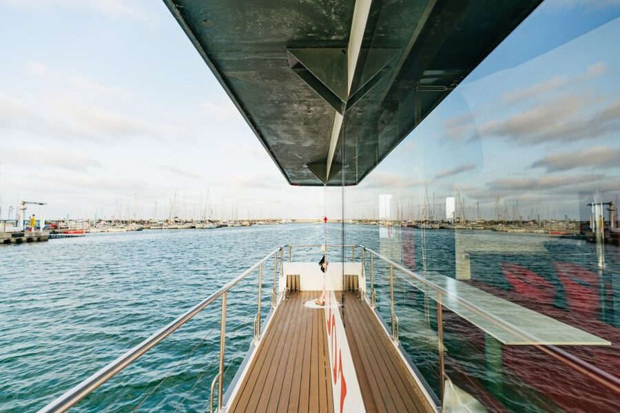 Valencia: Sunset or Daytime Catamaran Cruise with Drink - Leaving the marina among yachts and cruise ships